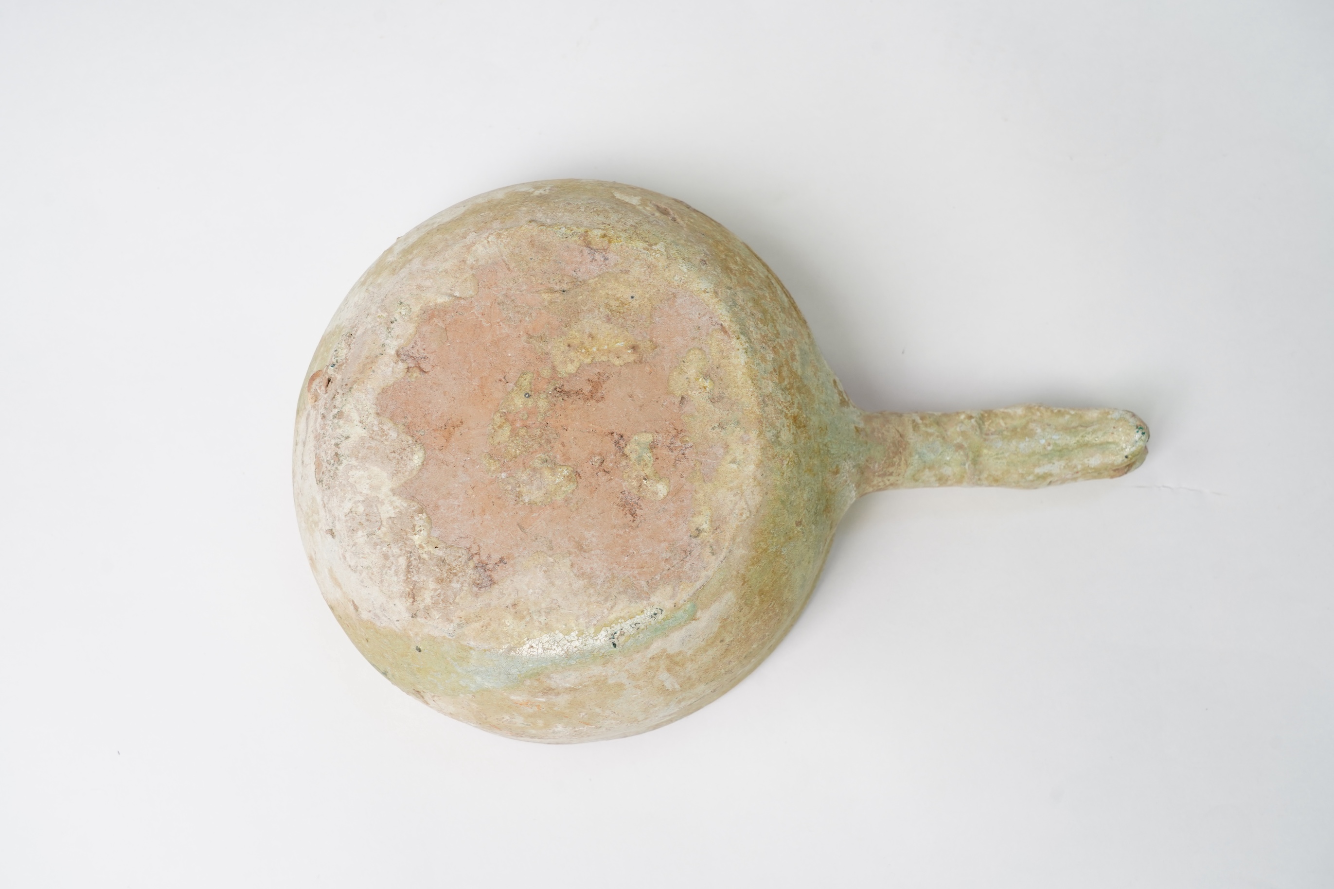 A Chinese earthenware scoop and a similar ladle, Han Dynasty (1st-2nd century A.D.)